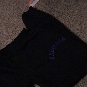 *3/15*  Black sweatpants with blue writing